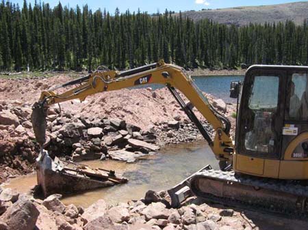 11-Brown Duck Lake Stabilization, demolition of inlet structure using stinger attached to trackhoe