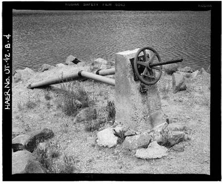 HAER photo of inclined outlet gate wheel and stem, looking northwest, July 1985