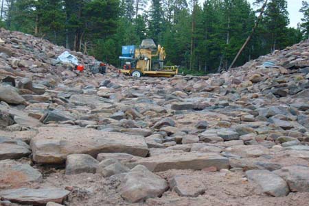 24-Clements Lake stabilization, looking downstream through excavated and rip rap lined breach