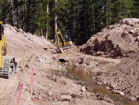 08-Deer Lake Stabilization, view of breach cut before outlet pipe was removed