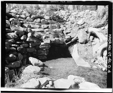 HAER photo of Deer Lake downstream outlet pipe and stone collar, looking north, July 1985