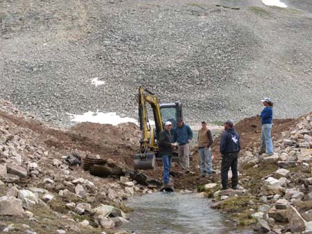 04-Drift Lake Stabilization, crew cut through dam and removed outlet pipe