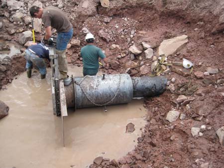 09-East Timothy Stabilization, DCWCD and UCC crews install head structure designed for up to 30lb back pressure