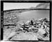 HAER photo of upstream face of East Timothy Lake Dam, spillway in background, July 1985