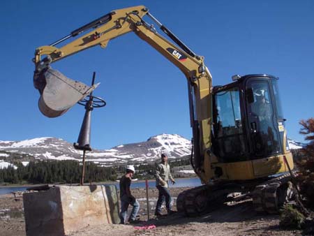 08-Five Point Lake Stabilization, trackhoe removing outlet works