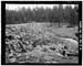 HAER photo of downstream face and toe of Island Lake Dam, July 1985