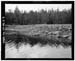 HAER photo of upstream face of Island Lake Dam, showing outlet gate, July 1985