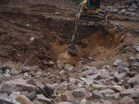 14-Kidney Lake Stabilization, grouted outlet pipe with sand filter at downstream end