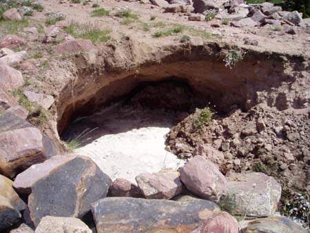 Seepage hole in Kidney Lake Dam prior to stabilization (3)