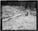 HAER photo of inclined outlet gate wheel and stem at Kidney Lake Dam, July 1985