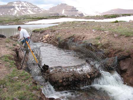 01-Superior Lake Stabilization, hand crew removes gabions from old spillway