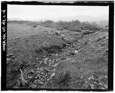 HAER photo of rock-lined spillway at Superior Lake Dam, looking northwest, July 1985