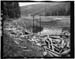 HAER photo of Water Lily Lake, upstream face of dam and upright inoperable outlet gate, July 1985