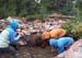 04-White Miller Lake Stabilization, removing logs from channel, sloped bank in background